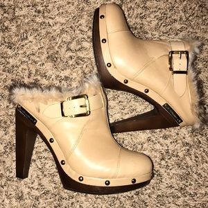 Cream color leather heel.